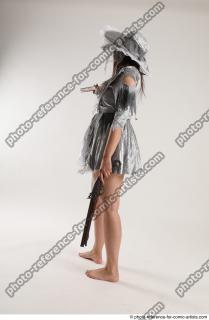 2020 01 LUCI AVIOL STANDING POSE WITH TWO GUNS (12)